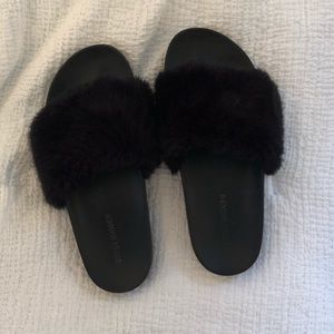 Black fuzzy Steve Madden slides